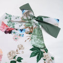 Pamela – Ærmeløs halterneck top med blomsterprint & slim-fit