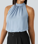 Ærmeløs Nicole-bluse med halterneck-design og afslappet