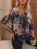 Katharine - Blomsterprintet overlaybluse med korte ærmer og