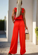 Serena – Jumpsuit uden ærmer med brede ben med åben ryg og justerbare stropper