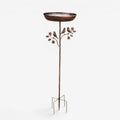 Dekorativ fuglebadsskål til haven med blomsterdetaljer