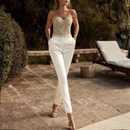 Freya – Slim fit ærmeløs jumpsuit med flared bukser