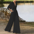 Daisy – Løs kortærmet jumpsuit med V-hals