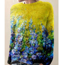 Nancy - Stilfuld blomsterprintet sweater med lange ærmer og