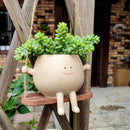 SmileSprout - Svingende urtepotter med smil