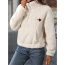 Elegant Amaya pullover med halv lynlås, lange ærmer og