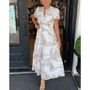 Monica – Kortærmet maxikjole med v udskæring og unikt print