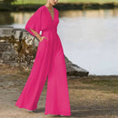Daisy – Løs kortærmet jumpsuit med V-hals