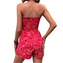 Loreen - Dame bandeau jumpsuit med blomsterprint & lommer