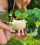 SmileSprout - Svingende urtepotter med smil