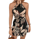 Norah - Stilfuld off-shoulder jumpsuit med halterneck og