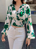 Marika - Elegant bluse med V-hals, lange ærmer og