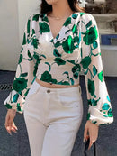 Marika - Elegant bluse med V-hals, lange ærmer og