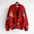 Lena V-hals cardigan med broderi patchwork og knaplukning