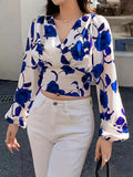 Marika - Elegant bluse med V-hals, lange ærmer og