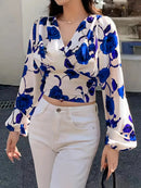 Marika - Elegant bluse med V-hals, lange ærmer og