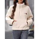 Elegant Amaya pullover med halv lynlås, lange ærmer og