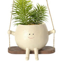 SmileSprout - Svingende urtepotter med smil