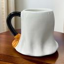 Søde Halloween-Spøgelsesmug med Bogdesign