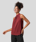 Ærmeløs Nicole-bluse med halterneck-design og afslappet