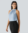 Ærmeløs Nicole-bluse med halterneck-design og afslappet
