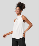 Ærmeløs Nicole-bluse med halterneck-design og afslappet