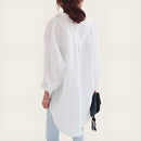 Elegant oversized skjorte fra Zariah med lange ærmer og