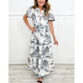 Monica – Kortærmet maxikjole med v udskæring og unikt print