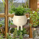 SmileSprout - Svingende urtepotter med smil