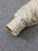 Alana - Glitrende off-shoulder kjole med sequin-detaljer