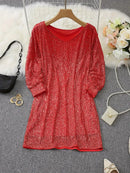 Alana - Glitrende off-shoulder kjole med sequin-detaljer