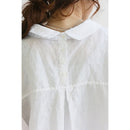 Elegant oversized skjorte fra Zariah med lange ærmer og