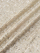 Alana - Glitrende off-shoulder kjole med sequin-detaljer
