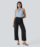 Ærmeløs Nicole-bluse med halterneck-design og afslappet