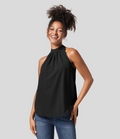 Ærmeløs Nicole-bluse med halterneck-design og afslappet