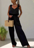 Ærmeløs Serena jumpsuit med vide ben og åben ryg