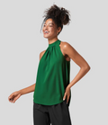 Ærmeløs Nicole-bluse med halterneck-design og afslappet
