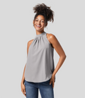 Ærmeløs Nicole-bluse med halterneck-design og afslappet