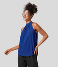 Ærmeløs Nicole-bluse med halterneck-design og afslappet