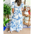 Monica – Kortærmet maxikjole med v udskæring og unikt print