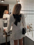 Greta - Elegant midikjole med glimmer og glans