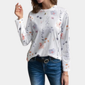 Ashley – Moderne bluse med rund hals og blomsterprint