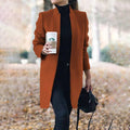 Langærmet trenchcoat med et afslappet elegant look