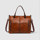 Galena - Vintage-inspireret crossbody-taske med flere lommer
