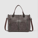 Galena - Vintage-inspireret crossbody-taske med flere lommer