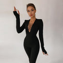 Layla afslappet jumpsuit med lange ærmer og dyb V-hals