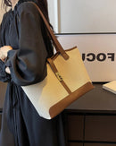 Ellie - Moderne skuldertaske med justerbar rem og rummelig inderside