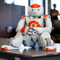 Interaktiv robot til børn, der danser, taler og lærer