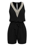 Solene - Alsidig jumpsuit med V-udskæring og blonder