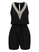 Solene - Alsidig jumpsuit med V-udskæring og blonder